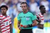 FILE - United States' Folarin Balogun, right, stands by after being issued a red card by Referee Raphael Claus, of Brazil, centre, as United States' Weston McKennie (8) looks on during the World Cup round of 32 soccer match between the United States and Bosnia in Santa Clara, Calif., near San Francisco, Wednesday, July 1, 2026. (AP Photo/Martin Meissner, File)