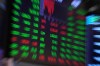 A board above the trading floor of the New York Stock Exchange is shown in this image, Tuesday, July 1, 2025. (AP Photo/Richard Drew)