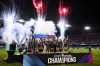 FILE - NJ/NY Gotham FC lift the NWSL championship trophy after defeating the Washington Spirit in a NWSL women's championship soccer match, Nov. 22, 2025, in San Jose, Calif. (AP Photo/Justine Willard, File)