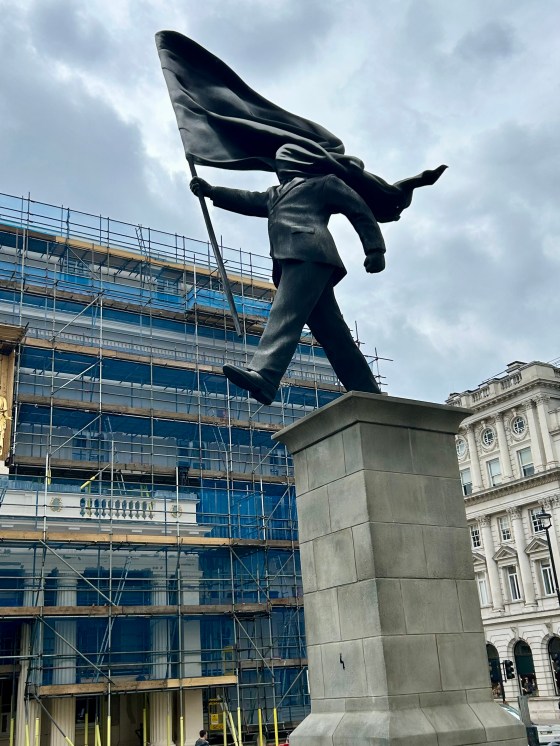 Banksy’s new statue stands among the more historic pieces located at Waterloo Place. (Ben Sigurdson / Free Press)