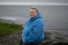 Lisa Marr, a retired paramedic who lives with PTSD, poses in Cow Bay, N.S. on Wednesday, June 24, 2026, where she goes to watch the waves and think of her parents in times of stress. THE CANADIAN PRESS/Darren Calabrese