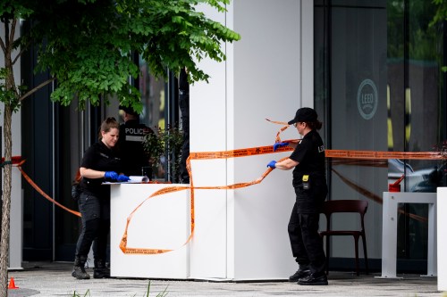 Montreal police work the scene of a shooting the day before, in Montreal on Tuesday, June 23, 2026. THE CANADIAN PRESS/Christopher Katsarov