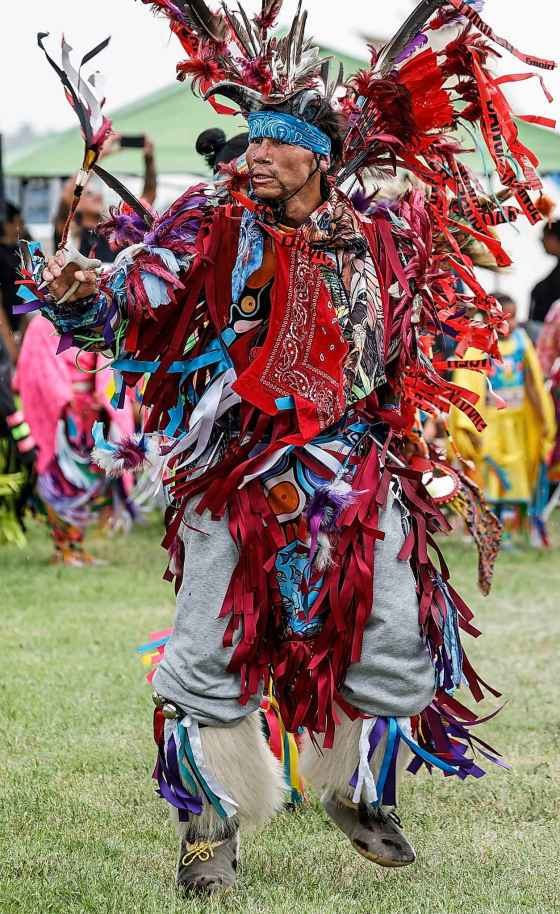 A dancer during the grand entrance of the powwow at Anishinaabe Days on Sunday. (John Woods / Free Press)