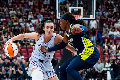 Toronto Tempo's Marina Mabrey (3) is defended by Dallas Wings' Arike Ogunbowale (24) as she drives towards the net during first half WNBA basketball action, in Montreal on Friday, July 10, 2026. THE CANADIAN PRESS/Christopher Katsarov