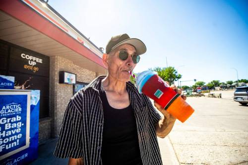 MIKAELA MACKENZIE / FREE PRESS
                                Leslie Campbell with his Slurpee at 7-Eleven on Monday.