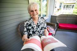 MIKAELA MACKENZIE / FREE PRESS 	 George Toles with his newest book, All the People in My Head