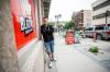 MIKAELA MACKENZIE / FREE PRESS 	 Eric Saniuk, owner of Blazing Chicken Shack on Graham Avenue, on Thursday, July 2, 2026. The fried chicken joint saw less customer traffic over the past year, likely due to buses being rerouted off Graham Avenue. For Gabby story. Free Press 2026