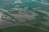 MIKE DEAL / FREE PRESS
                                Flooded farmland between Swan River, MB, and Winnipeg, MB. Manitoba Premier Wab Kinew flew to Dauphin, MB and Swan River, MB on Thursday to get a first hand look at some of the flood damage and to meet with officials and victims who are still in the midst of dealing with the situation. 260702 - Thursday, July 02, 2026.