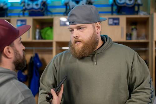 BROOK JONES/FREE PRESS
                                Winnipeg Blue Bombers offensive lineman Chris Kolankowski (right) talks to reporters in the Blue Bombers locker room after the 2024 season.