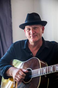 Mikaela MacKenzie / Free Press files
                                Mark Reeves plays Saturdays on Sargent at noon and 1 p.m. at Jeffreys Barbershop.