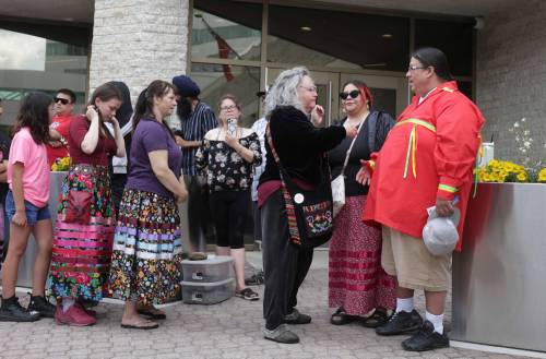 Ruth Bonneville / Free Press
                                Norman Lagimodiere, right, and Courtney Lagimodiere, parents of Kiana Everett, speak to supporters outside the Winnipeg Remand Centre on Monday.