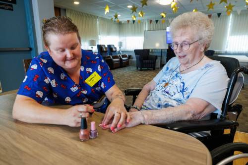 MIKE DEAL / FREE PRESS
                                Health-care aide Jackie Goundry gives Margaret Ward&rsquo;s nails a fresh coat of nail polish. Highly personalized care is one of the reasons why the Convalescent Home is one of Canada&rsquo;s top-rated personal care homes.