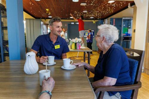 Photos by MIKE DEAL / FREE PRESS 
                                CEO Justin Lagace joins Pauline Kolbuck, who turned 101 in May, for tea and a visit. The staff&rsquo;s mission is to treat all residents like family.