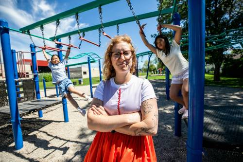 MIKAELA MACKENZIE / FREE PRESS
                                Grade five/six teacher Tia Friesen with students Fiona and Selena at the Darwin School playground on Tuesday. Their class spent much of the year researching accesible playgrounds and advocating for upgrades, but were disappointed to learn about how costly it would be to include their classmate, who is in a wheelchair.