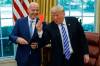 THE ASSOCIATED PRESS FILES
                                U.S. President Donald Trump holds up a red card in the Oval Office as FIFA president Gianni Infantino looks on.