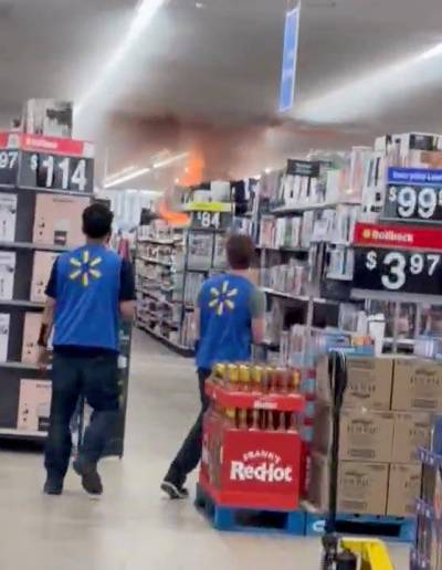 Fire is seen at a Walmart at St. Vital Centre on Monday. (Supplied)