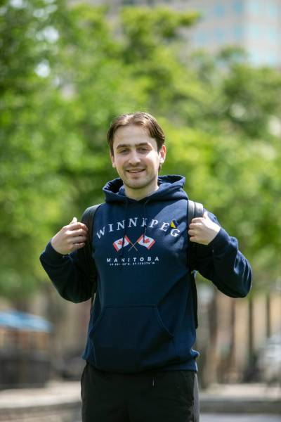 BROOK JONES / FREE PRESS
                                Ukrainian Andrian Makhnachov has become a successful social media influencer, largely through embracing Indigenous culture.