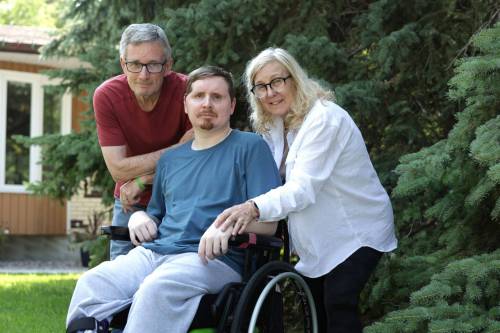 Ruth Bonneville / Free Press
                                Will Castor, shown with his parents Doug and Cheryl Castor, has a traumatic brain injury caused by a car crash. Cheryl Castor is fighting to restore a critical rehabilitation service for Manitobans that was of great benefit to her son.