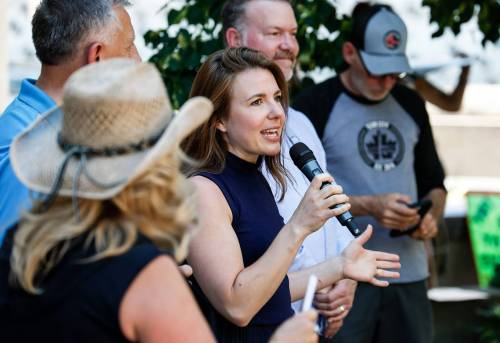JOHN WOODS / FREE PRESS
                                Tory MP, Raquel Dancho, speaks at the city hall protest, Monday.