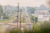 MIKE DEAL / FREE PRESS The smokey view from the top of Garbage Hill in Westview Park looking south along the rail lines showing traffic crossing Sargent Avenue, Ellice Avenue and St. Matthews Avenue in Winnipeg. The smoke is caused by forest fires in Northwestern Ontario and poor air quality has been forecast, so, people with health risks should limit their time outdoors. 260717 - Friday, July 17, 2026.