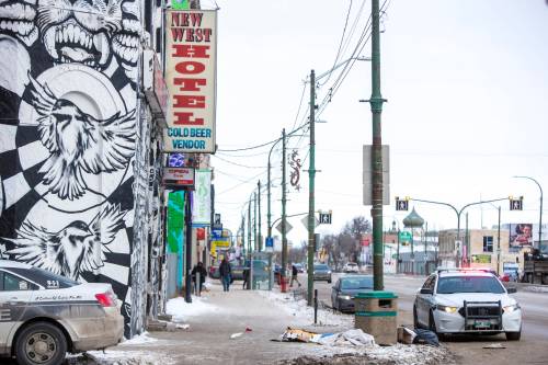 MIKAELA MACKENZIE / FREE PRESS FILES
                                Two teens drinking beer outside the New West Hotel around 1 a.m. realized they had missed their last bus home when a 22-year-old woman approached and offered them a place to &ldquo;hang out&rdquo; while they waited for the next bus.