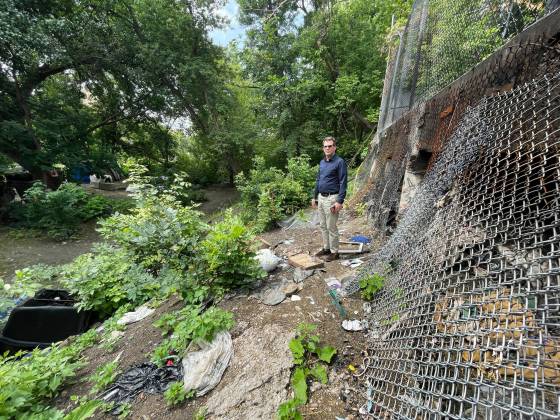 Marvin Sharp stands near the encampments on the property at 35 Balmoral. (Ruth Bonneville / Free Press)