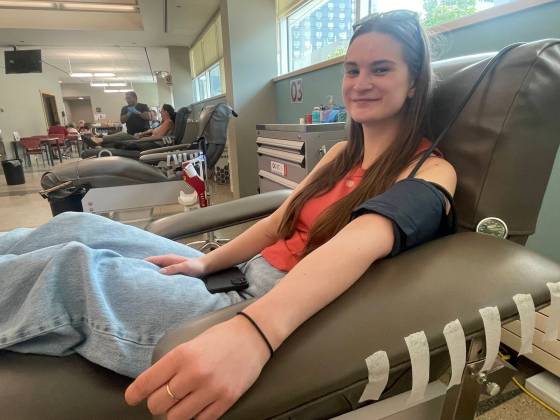 Sage Zdebiak says she gives blood so that health-care workers can continue to help others the way they helped her. (Tiago Resko / Free Press)