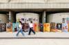 MIKE DEAL / FREE PRESS 
                                Fringe festival posters and sandwich boards line the sidewalk along Market Avenue beside the Royal Manitoba Theatre Centre.