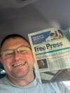A photo of Grant Park Pirates coach Doug Kovacs grinning beside a Free Press article with allegations of hazing has been circulating in the football community.