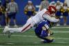 JOHN WOODS / THE CANADIAN PRESS
                                Quarterback Dru Brown gets sacked by Stampeders&rsquo; Clarence Hicks during the second half of CFL football action at Princess Auto Stadium.