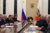 Gavriil Grigorov / Sputnik, Kremlin Pool Photo via AP
                                Russian President Vladimir Putin, center, chairs a meeting on domestic fuel supplies at the Kremlin in Moscow on June 28.