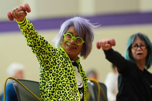 Lindsey Wasson / The Associated Press files
                                Bengie Santos, 72, leads an exercise class for older adults earlier this year in Shoreline, Wash.