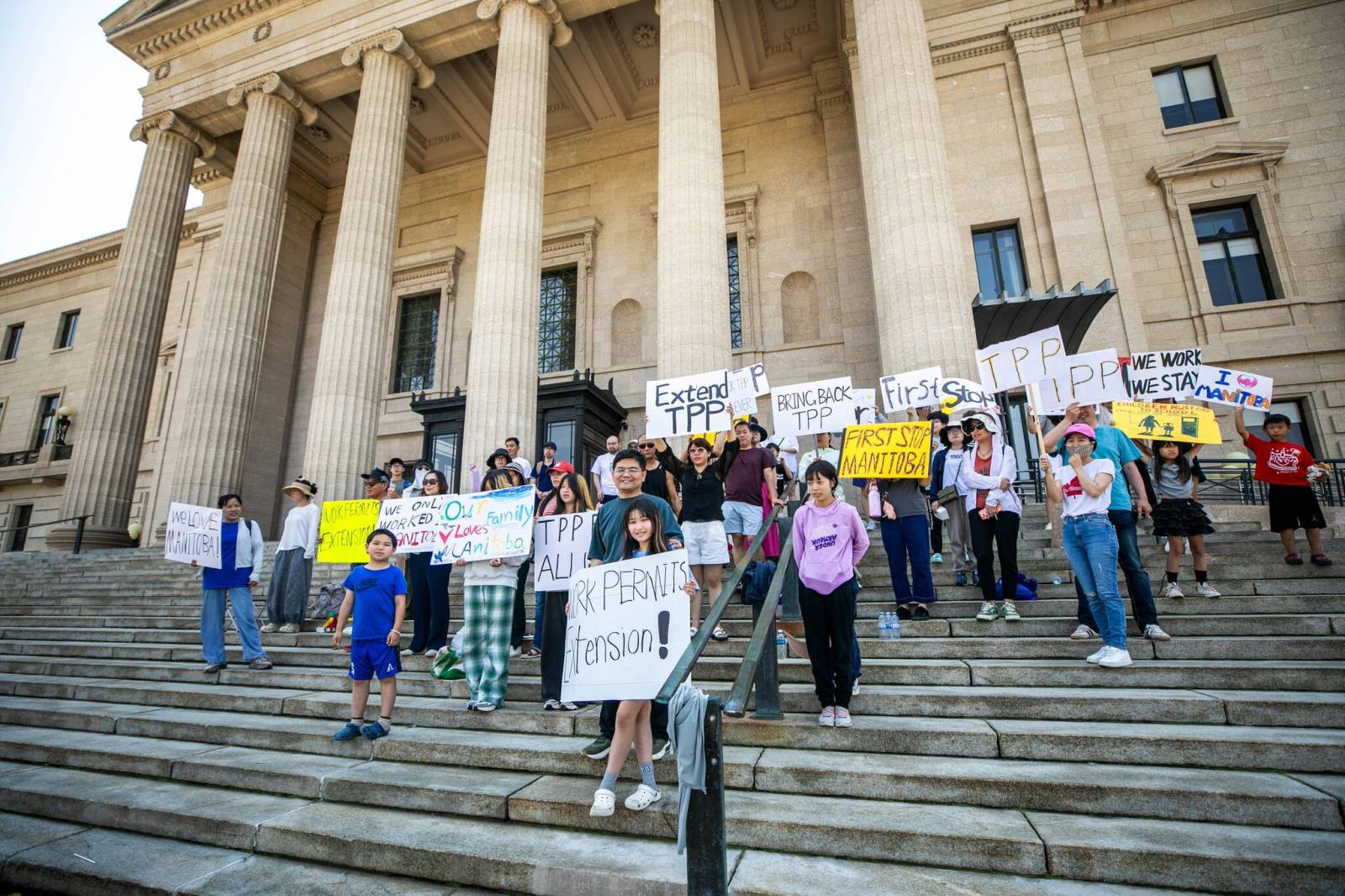 Temporary foreign workers rally to stay