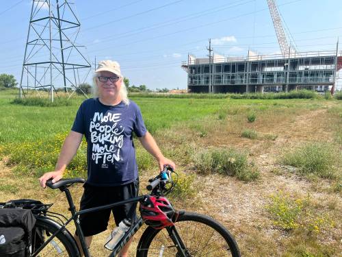 ZOE PIERCE / FREE PRESS
                                Mark Cohoe, executive director of Bike Winnipeg, in front of where the construction of the path will take place.