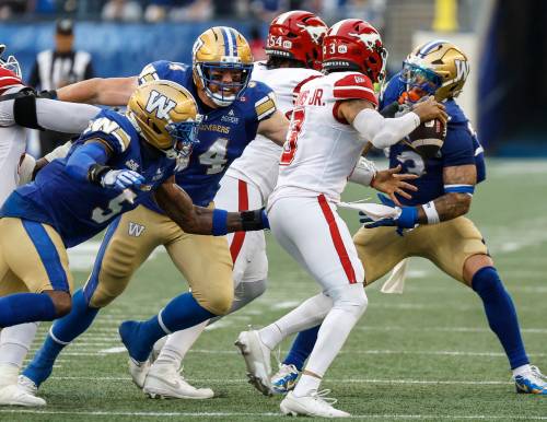 John Woods / THE CANADIAN PRESS
                                Winnipeg Blue Bombers&rsquo; Willie Jefferson (far left) sacks Calgary Stampeders quarterback Vernon Adams Jr. last week with the help of teammates Jake Ceresna (left) and Michael Fletcher (right). The B.C Lions have allowed 18 sacks so far this season, while Winnipeg leads in sacks with 15.