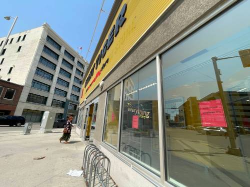 Ruth Bonneville / Free Press
                                Red flyers tacked to Giant Tiger&rsquo;s front windows announce the location will be closing Nov. 7.