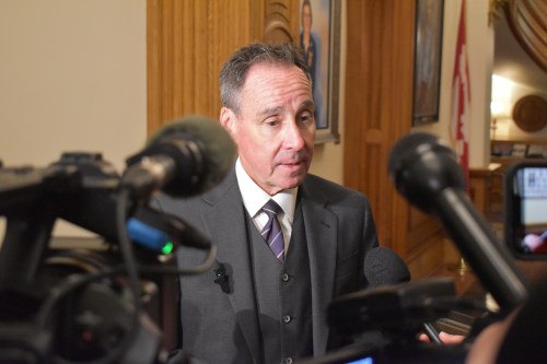 New Brunswick Natural Resources Minister John Herron speaks the media inside the legislature in Fredericton, on Wednesday, May 13, 2026. THE CANADIAN PRESS/Eli Ridder