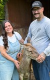 Carole Lyne Laramee and her husband are pictured at Marineland with one of the red deer named Snuggles in this undated photo. THE CANADIAN PRESS/Handout - Carole Lyne Laramee (Mandatory Credit)