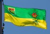 Saskatchewan says investigators are looking into the death of two people in the province's north who are suspected of being killed by wildlife. Saskatchewan's provincial flag flies on a flag pole in Ottawa, Monday, July 6, 2020.THE CANADIAN PRESS/Adrian Wyld