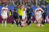 Referee Ivan Arcides Barton Cisneros, of El Salvador, signals to ask for a VAR review before issuing a red card to Paraguay's Miguel Almiron (10) during the World Cup Group D soccer match between Turkey and Paraguay in Santa Clara, Calif., near San Francisco, Friday, June 19, 2026. (AP Photo/Eugene Hoshiko)