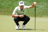 Eric Cole lines up his putt on the 18th green during the first round of the Travelers Championship golf tournament at TPC River Highlands, Thursday, June 25, 2026, in Cromwell, Conn. (AP Photo/Jessica Hill)