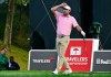Scottie Scheffler reacts to his tee shot on the 18th hole during the final round of the Travelers Championship golf tournament at TPC River Highlands, Sunday, June 28, 2026, in Cromwell, Conn. (AP Photo/Jessica Hill)