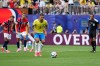 Brazil's Bruno Guimaraes (8) takes a penalty kick during the World Cup round of 16 soccer match between Brazil and Norway in East Rutherford, N.J., near New York, Sunday, July 5, 2026. (AP Photo/Frank Franklin II)