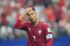 Portugal's Cristiano Ronaldo (7) reacts during the World Cup round of 16 soccer match between Portugal and Spain in Arlington, Texas, near Dallas, Monday, July 6, 2026. (AP Photo/Julio Cortez)