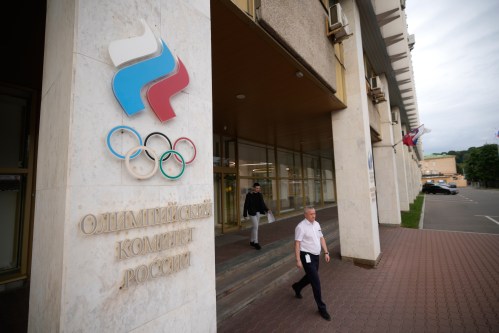 A man walks from the Russian National Olympic Committee building in Moscow, on Tuesday, July 7, 2026. (AP Photo/Pavel Bednyakov)