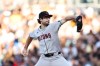 Arizona Diamondbacks pitcher Zac Gallen winds up against a San Diego Padres' batter in the first inning of a baseball game Tuesday, July 7, 2026, in San Diego. (AP Photo/Derrick Tuskan)