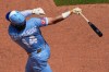 Kansas City Royals' Jac Caglianone watches his sacrifice fly to score one run during the fifth inning of a baseball game against the Philadelphia Phillies, Sunday, July 5, 2026, in Kansas City, Mo. (AP Photo/Charlie Riedel)
