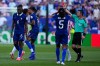 Referee Ilgiz Tantashev of Uzbekistan show the yellow cardto France's Michael Olise during the World Cup round of 16 soccer match against Paraguay in Philadelphia, Saturday, July 4, 2026. (AP Photo/Petr David Josek)