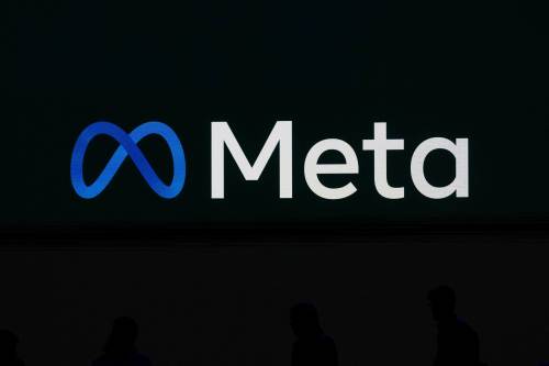 A Meta logo is shown on a video screen at LlamaCon 2025, an AI developer conference, in Menlo Park, Calif., Tuesday, April 29, 2025. (AP Photo/Jeff Chiu)