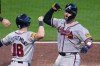 Atlanta Braves' Joey Bart, right, celebrates with Mike Yastrzemski as he returns to the dugout after hitting a two-run home rum off Pittsburgh Pirates pitcher Dennis Santana during the eighth inning of a baseball game in Pittsburgh, Wednesday, July 8, 2026. (AP Photo/Gene J. Puskar)